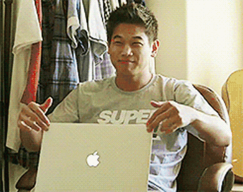 A laptop being thrown out a high window in anger.